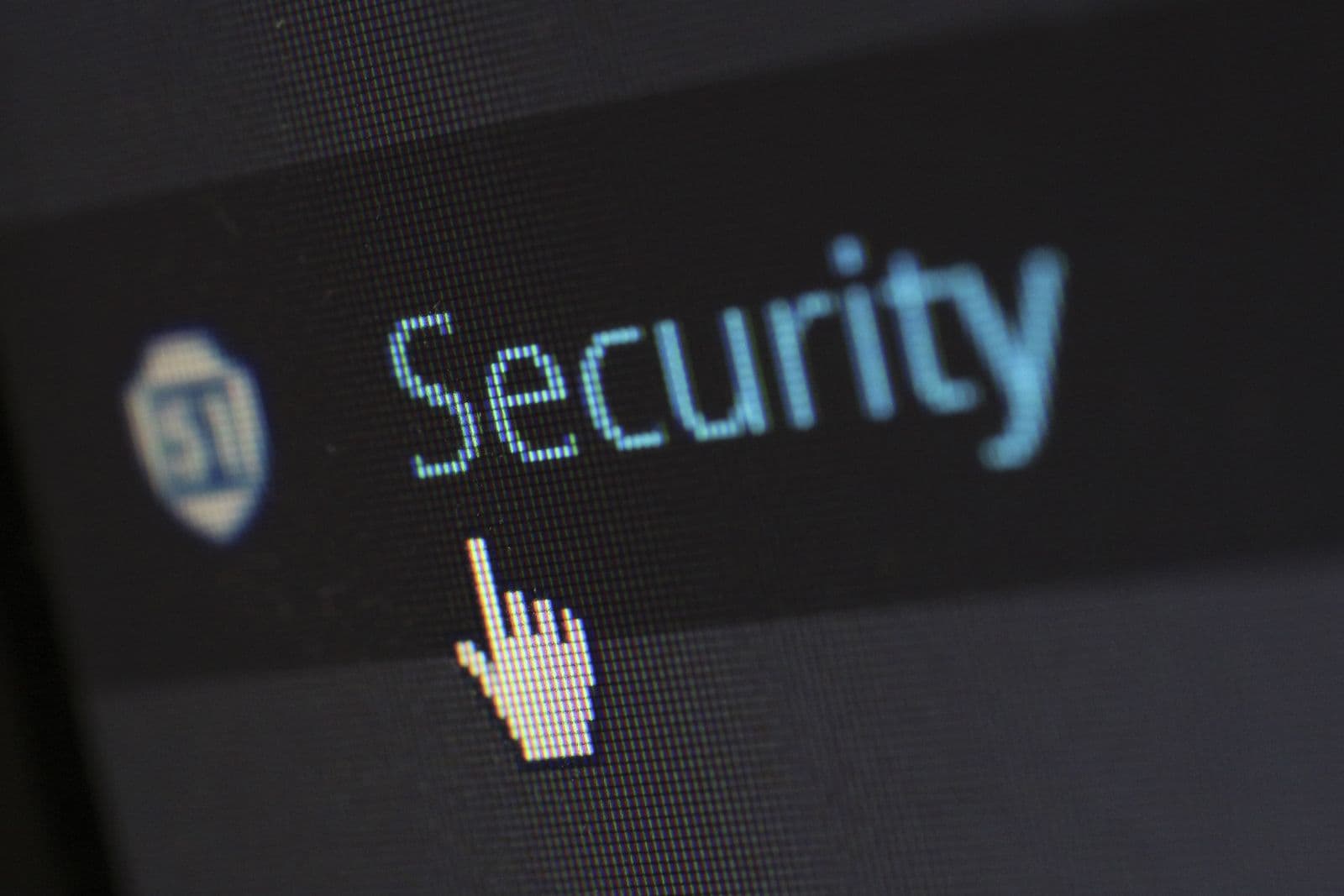 A padlock resting on a laptop keyboard