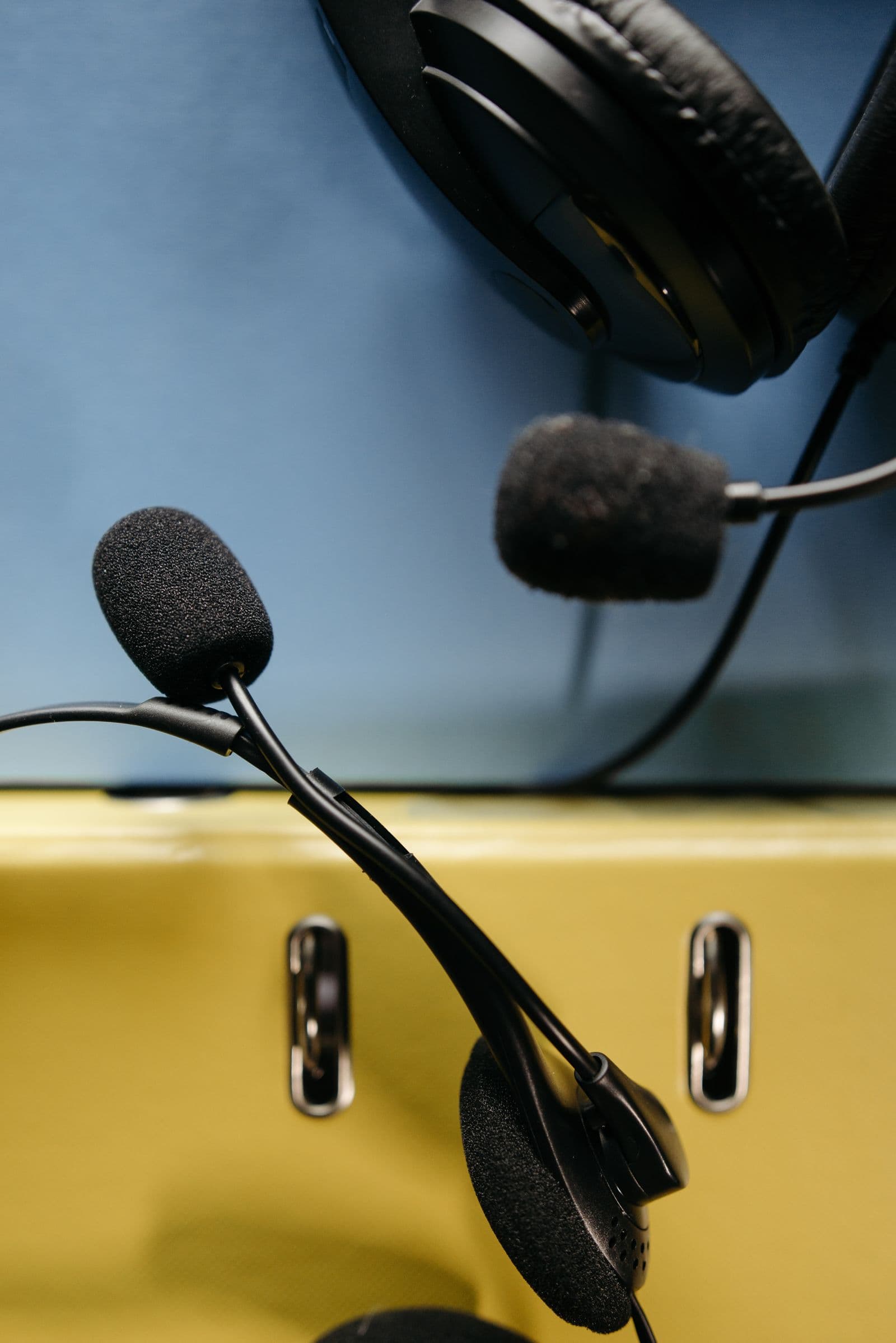 A support agent wearing a headset at their desk